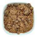 Organic Black Jaggery Powder from Nut Fusion, natural sweetener with dark brown granules and a textured appearance.