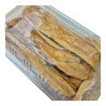 Organic dried melon slices from Nut Fusion, a natural dried fruit snack with vibrant orange, chewy texture, and sweet flavor.