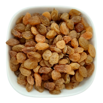 Nut Fusion yellow raisins, dried sultanas, close-up of plump golden dried fruit in a bowl.