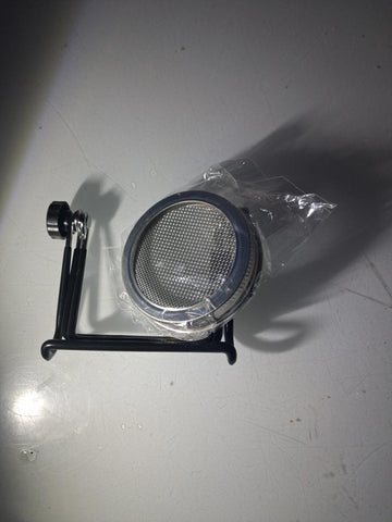 Mesh sprouting lid and foldable black stand. Jar not included.